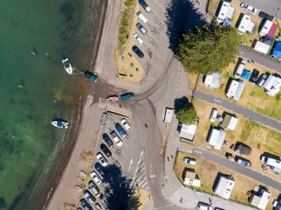 Aerial View from Houses close to the Beach, Green Trees, Mountain, Mount Maunganui, Boats in Tauranga, New Zealand - Bay of Plenty